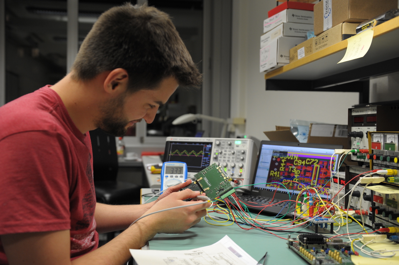 Pascal Hager of the Integrated Systems Laboratory is measuring a prototype board